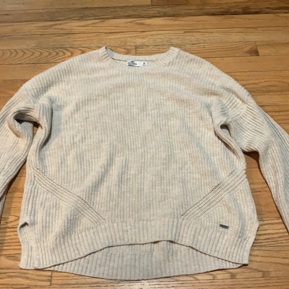 Beige Cross knit design at bottom sweater